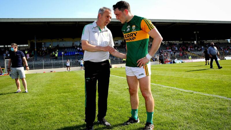 Kerry manager Peter Keane talks to Paudie Clifford ahead of the Munster SFC Final against Cork in Killarney. Photograph: Ryan Byrne/Inpho