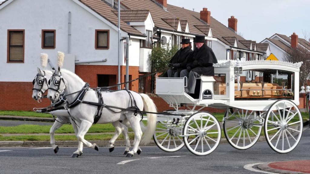 A horse-drawn carriage brings the coffin carrying the body of Sonia Blount from the Holy Rosary Church, Ballycragh, Tallaght. Photograph: Colin Keegan/Collins Dublin
