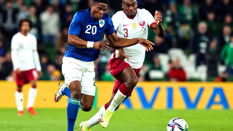 Ireland’s Chiedozie Ogbene runs past Abdelkarim Hassan of Qatar during the friendly international at the Aviva Stadium. Photograph: Morgan Treacy/Inpho
