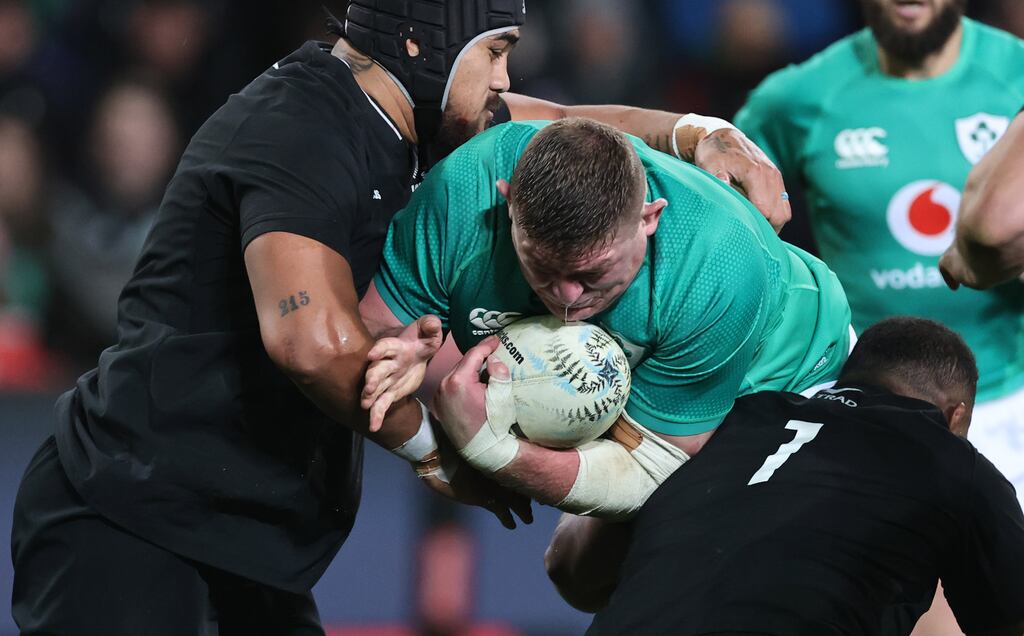 Ireland’s Tadhg Furlong is tackled by New Zealand's Karl Tu'inukuafe during the second Test in Dunedin. Photograph: Billy Stickland/Inpho