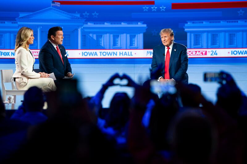 Fox News hosts Martha MacCallum and Bret Baier speak with Donald Trump during a Fox News Town Hall in Des Moines, Iowa, in January. Photograph: Haiyun Jiang/New York Times