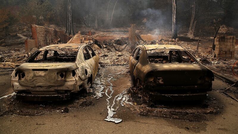 Burned cars sit idle after out-of-control wildfires moved through Glen Ellen, California, the US. Photograph: Justin Sullivan/Getty Images