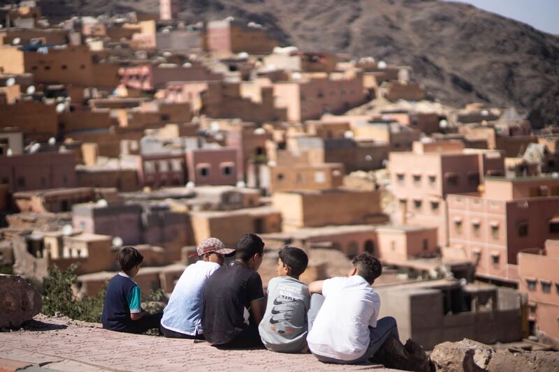 Children observe their home area of Moulay Brahim, which was damaged by the earthquake. Photograph: Mosa’ab Elshamy/AP