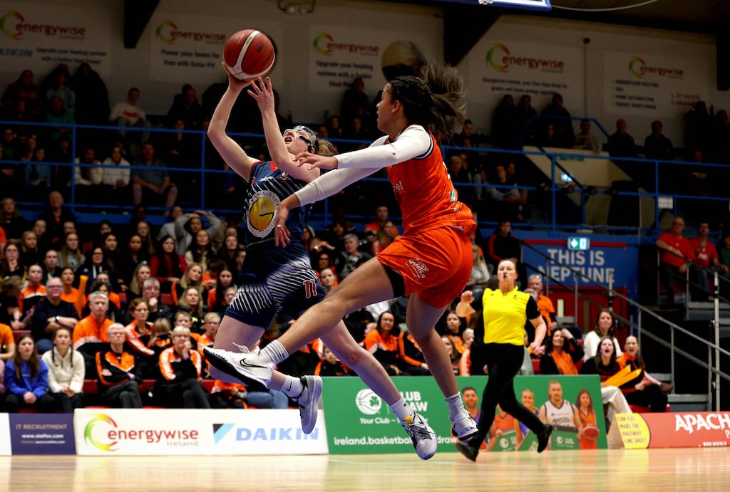 Irish captain Edel Thornton of Brunell is challenged by Killester's Jiselle Thomas during the National Cup semi-final at Neptune Stadium. Brunell won 92-78 to advance to an historic all-Cork final clash with Fr Matthews. Photograph: Ryan Byrne/Inpho