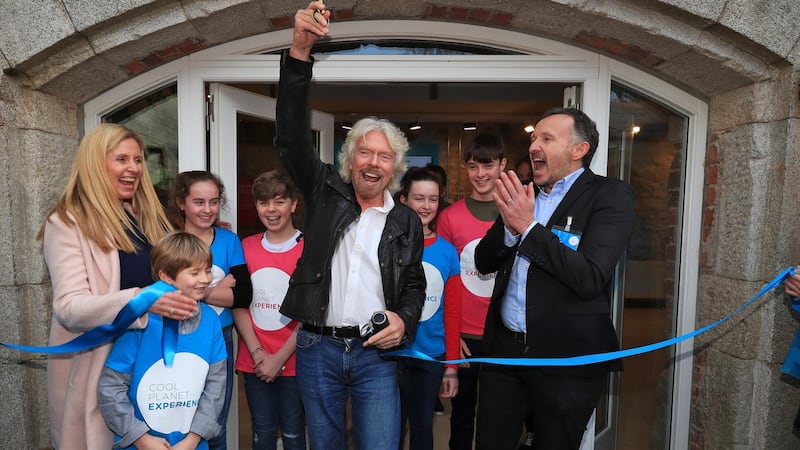 Cool Planet Experience chief executive Vicky Brown and chairman Norman Crowley with brand ambassador Ricard Branson at the opening of the venture. Photograph: Colin Keegan/Collins Dublin