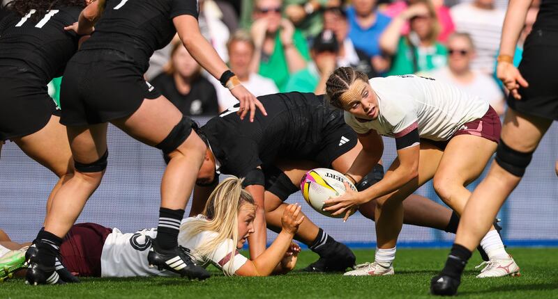 Ireland's Aoife Dalton with Aoibheann Reilly try to take the game to New Zealand. Photograph: Ben Brady/Inpho
