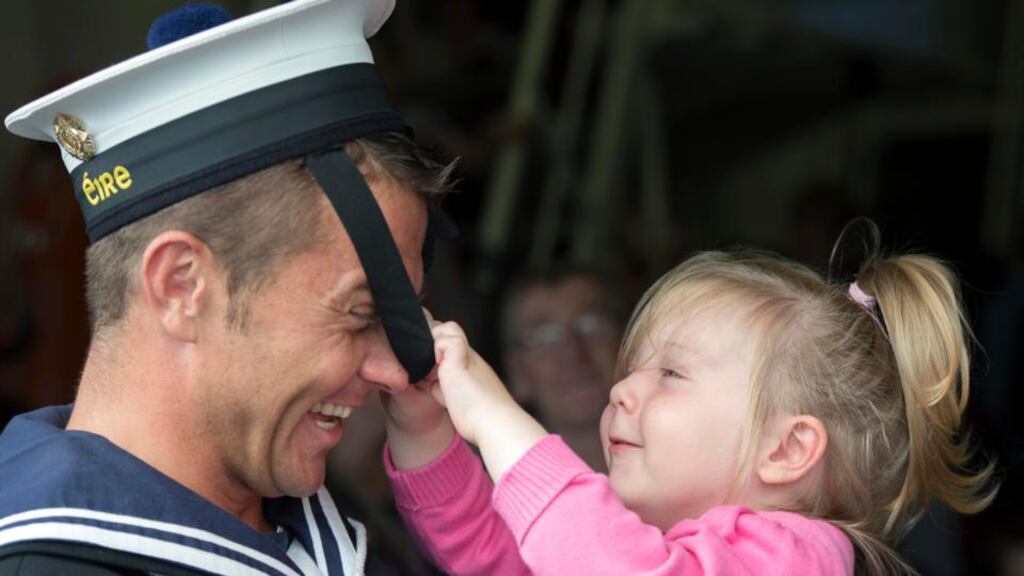 Chef Paul O’Shea with his daughter Caoimhe (2) on Friday as the LÉ Eithne returned to Haulbowline. Photograph: Michael Mac Sweeney/Provision