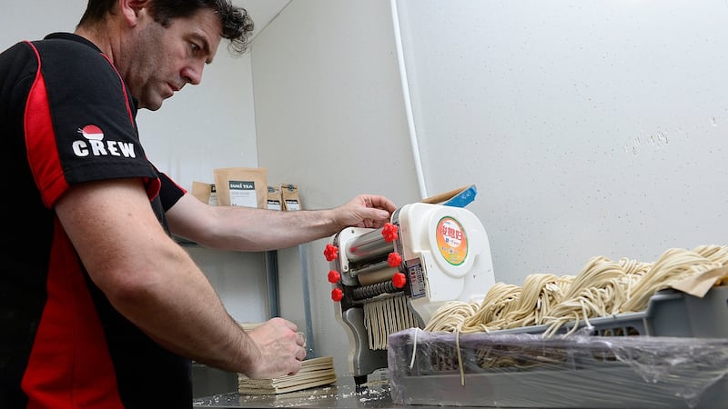 Brian Donnelly making noodles for ramen in his Belfast takeaway shop. Photograph: Arthur Allison/Pacemaker Press