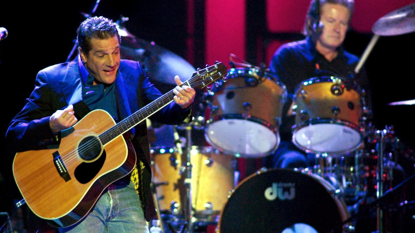 Singer/guitarist Glenn Frey of the Eagles, with singer/drummer Don Henley in the background, performs the song ‘New Kid In Town’ in Las Vegas in 2003. Photograph: Reuters