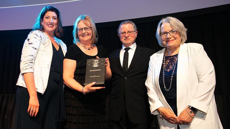 Breda O’Toole, Awards Judge, presents the Best SME HR Initiative award to Katherine Durcan, Robert O’Donnell & Miranda O’Donnell, VOYA Organic Beauty.