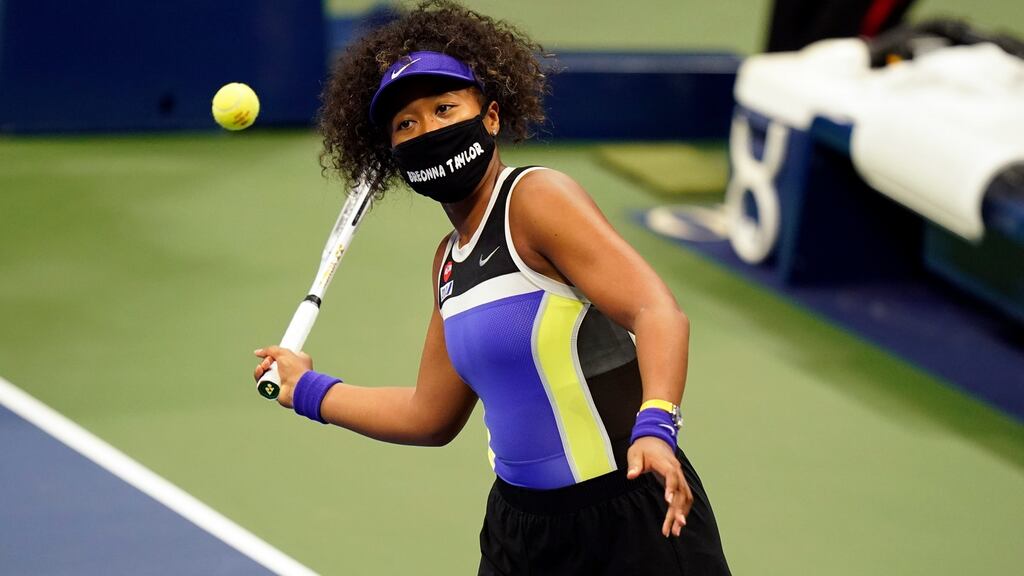 Naomi Osaka wears a facemask bearing the name of Breonna Taylor after her win overcMisaki Doi. Photograph: Frank Franklin II/AP