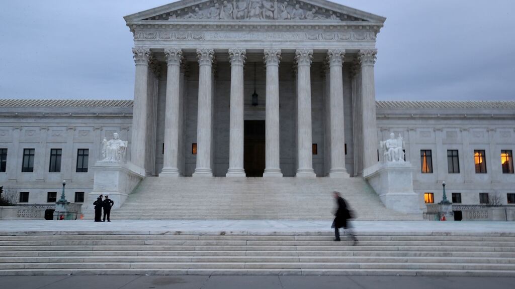 A man walks up the steps of the US supreme court in Washington, DC on Tuesday. President Donald Trump is due to announce his nomination to fill a year-long vacancy on the court. Photograph: Mark Wilson/Getty Images