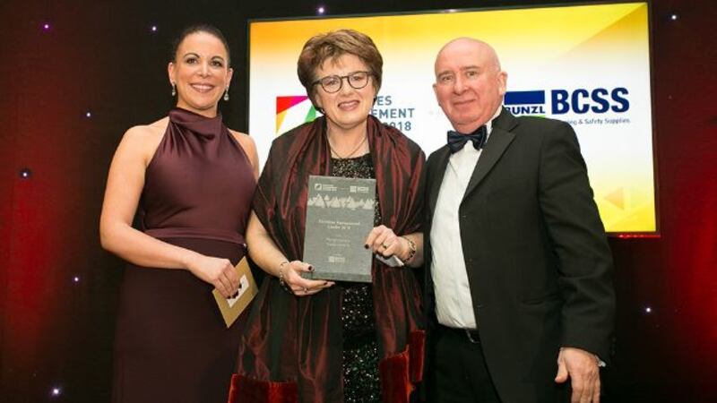 Graham Bowie, District Manager, Kimberly Clark and Claire Murphy, FM Sector Leader, Bunzl Cleaning & Safety Supplies present the Facilities Management Leader 2018 award to Margot Slattery, Sodexo Ireland