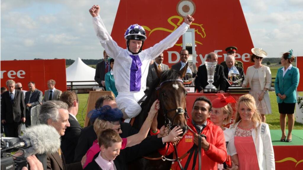 Kevin Manning on Trading Leather with trainer Jim Bolger after winning the  Irish Derby in the Curragh. Photograph: Dara Mac Dónaill/The Irish Times