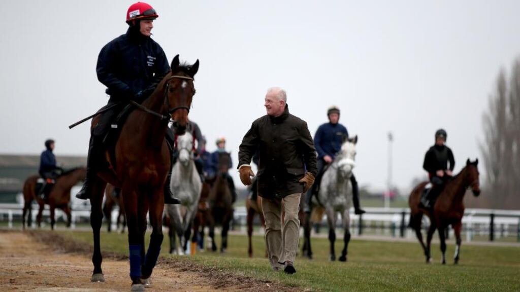 Hurricane Fly and Paul Townsend with trainer Willie Mullins at Cheltenham last week. Photograph: Dan Sheridan/INPHO