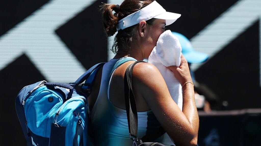Garbine Muguruza of Spain looks dejected after losing her second round singles match against Alize Cornet of France. Photograph: Mark Metcalfe/Getty Images