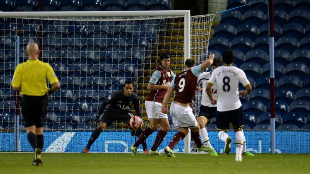 Burnley’s Sam Vokes steers home his side’s equaliser in the FA Cup third-round clash against Tottenham Hotspur at Turf Moor. Photograph: Martin Rickett/PA