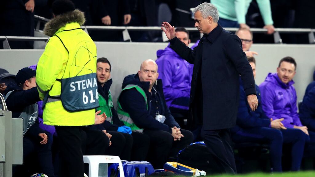 Tottenham Hotspur manager Jose Mourinho goes to high five a ballboy (partially obscured) after he quickly put the ball back in play in the build-up to Tottenham Hotspur’s second goal during the Champions League Group B match against Olympiakos at Tottenham Hotspur Stadium. Photograph: Adam Davy/PA Wire