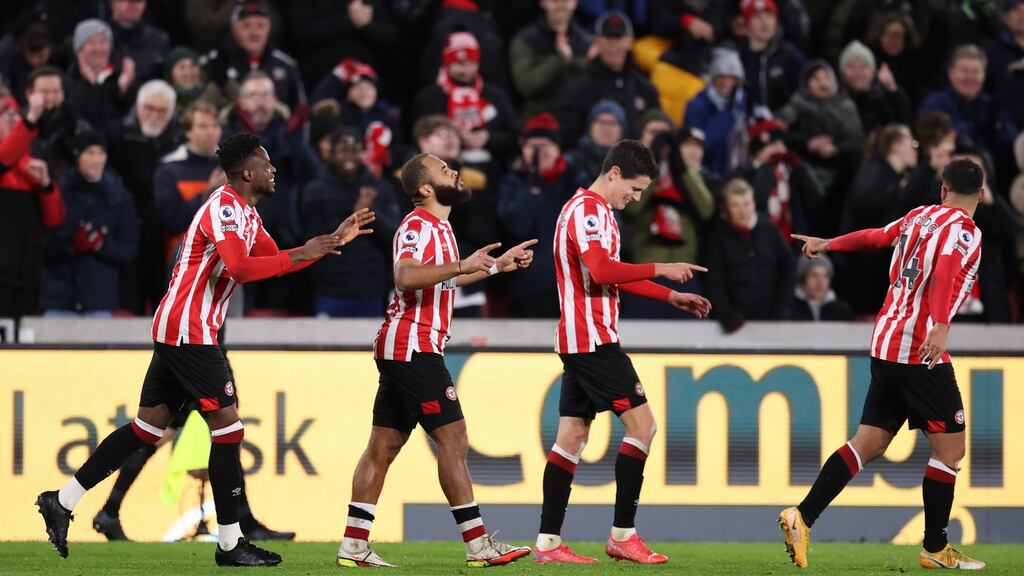 Bryan Mbeumo (second from left) celebrates with his Brentford team-mates after scoring a late winner in the Premier League game against Watford at Brentford Community Stadium. Photograph: Alex Pantling/Getty Images