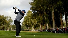 Rory McIlroy falls just short as JB Holmes prevails at Riviera