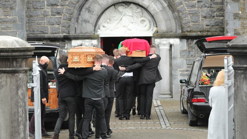 The coffins of Eileen and Jamie O’Sullivan are carried into St Michael’s Church in Lixnaw on Monday. Photograph: PA