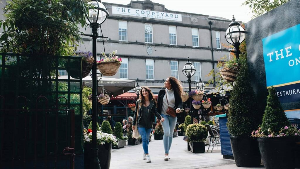 Friends out on a stroll in Cork city.