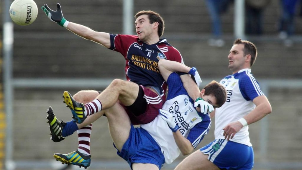 Ballinascreen’s Brendan Heron and Ballinderry’s Gareth McKinless battle for possession during the Derry senior football final at Celtic Park. Photo: Lorcan Doherty/Presseye/Inpho