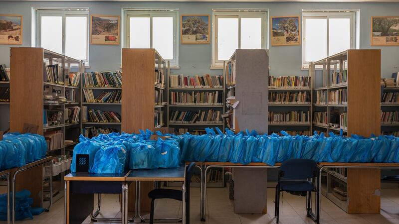 Books wrapped in plastic bags in Gymnasia Ha’ivrit high school’s library in Jerusalem on July 30th. Photograph: Dan Balilty/New York Times