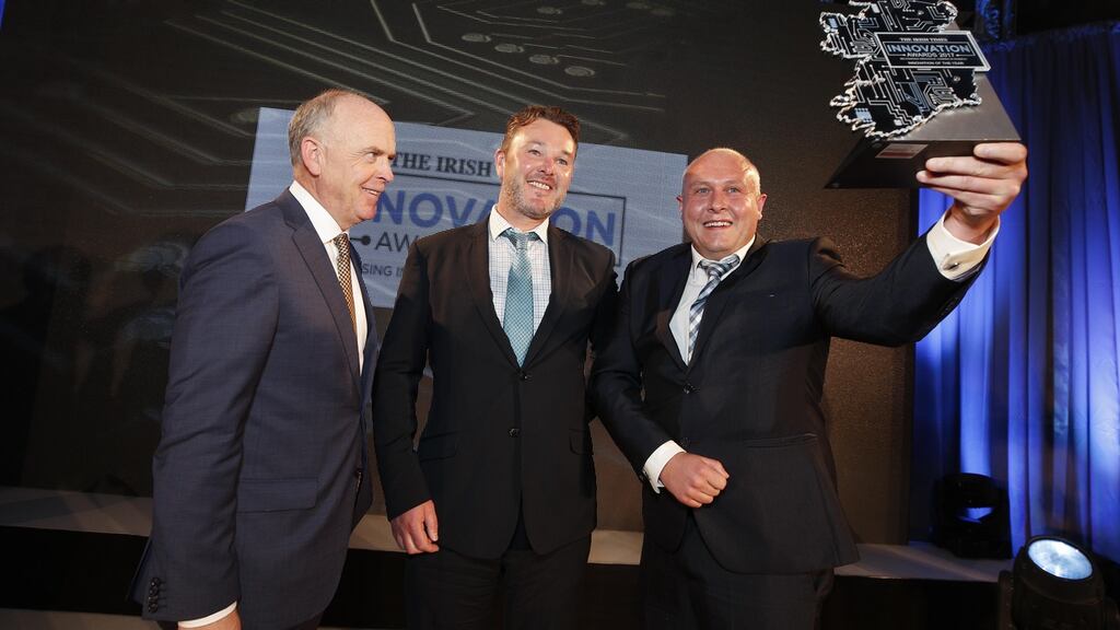 Liam Kavanagh, MD, The Irish Times presenting the overall Irish Times Innovation award to John Browne and Dr James Kennedy from Kastus at the Irish Times Innovation Awards 2017 which took place at the Royal Hospital Kilmainham. Photograph: Conor McCabe