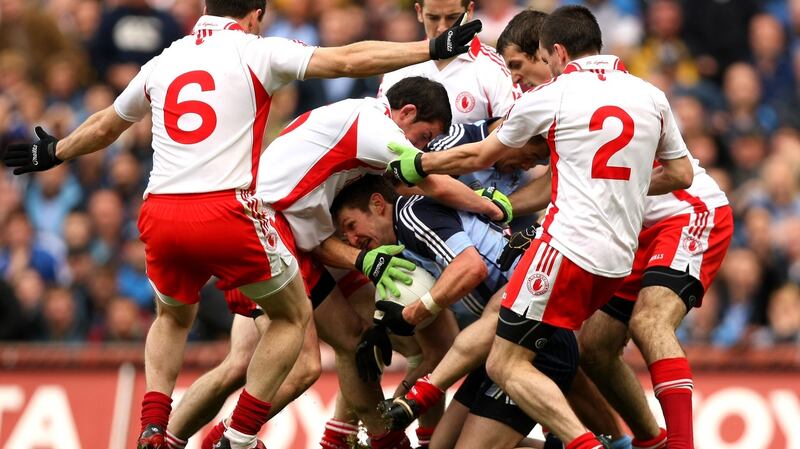 Dublin’s Kevin Bonner surrounded by Tyrone tacklers during the 2008 All-Ireland quarter final won by Tyrone. Photograph: James Crombie/Inpho