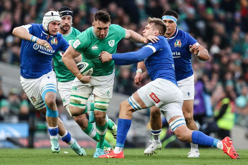 Ireland's Jack Conan evades a tackle from Italy's Federico Ruzza at the Aviva Stadium. Photograph: Ben Brady/Inpho