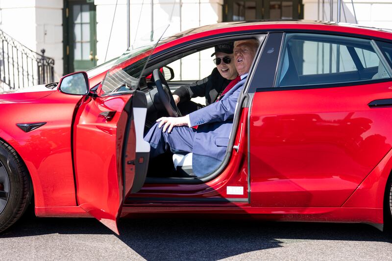President Donald Trump, with Elon Musk, inside a new Telsa on the South Grounds of the White House, on March 11th. Photograph: Doug Mills/The New York Times