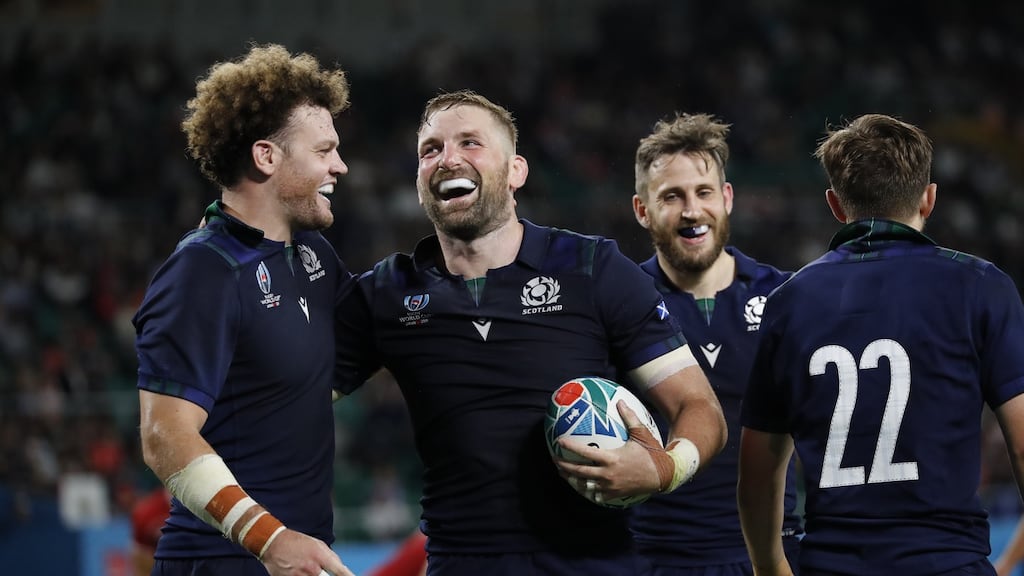 Scotland players celebrate with John Barclay after their 2019 Rugby World Cup win over Russia. Photo: Mark R. Cristino/EPA