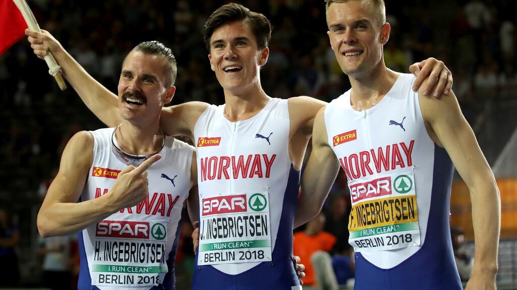 Henrik Ingebrigsten, Jakob Ingebrigsten and Filip Ingebrigsten of Norway celebrate Jakob’s victory in the Men’s 1500m final at the European Athletics Championships in Berlin. Photograph : Alexander Hassenstein/Getty Images