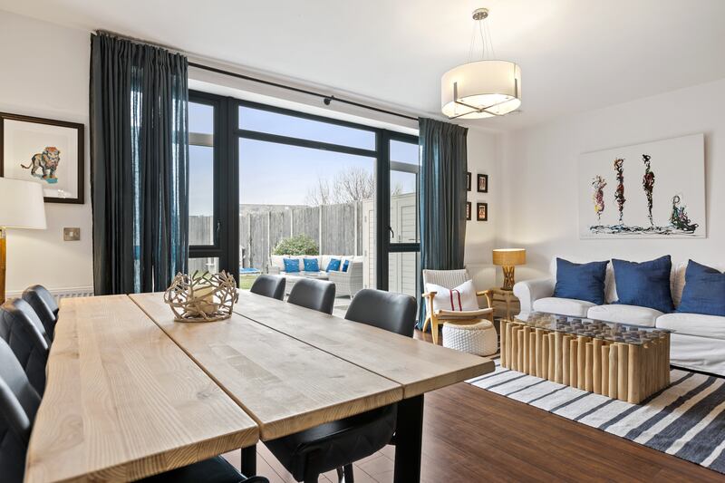 Open-plan living kitchen and dining area opens to the rear garden.