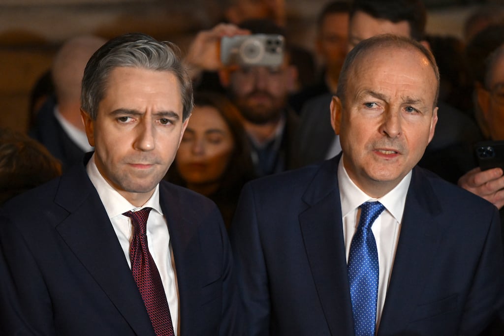 The current climate of uncertainty seemingly favours Micheál Martin (right) who comes across as more assured than the perpetually busy Simon Harris. Photograph: Charles McQuillan/Getty