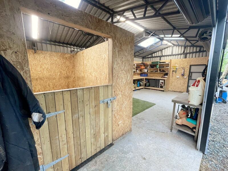 Garage with stable area.