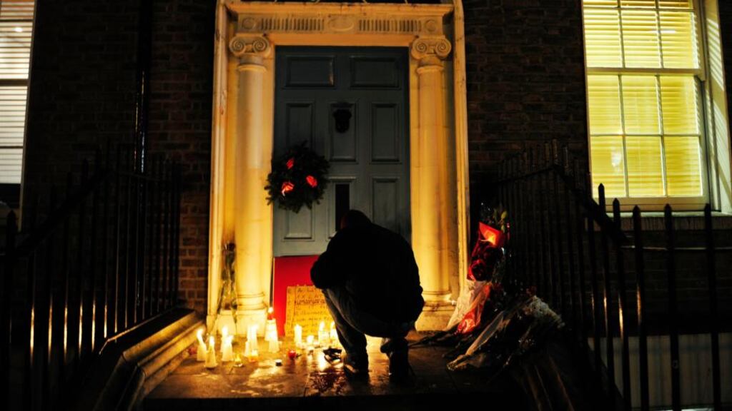 ‘Nobody could disagree with the fact that the three charities the Belvedere Sleepout support are worthy recipients. But what was appropriate 31 years ago as a charity endeavour is surely now outdated.’ Above, a man lights a candle outside at the doorway in Molesworth Street where Jonathan Corrie was found dead. Photograph: Aidan Crawley