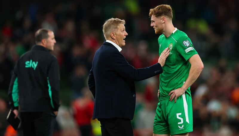 Republic of Ireland head coach Heimir Hallgrímsson speaks to Jake O'Brien. Photograph: James Crombie/Inpho