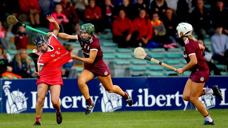 Galway’s Heather Cooney challenges   Cork’s Amy O’Connor during the Liberty Insurance All-Ireland Senior Camogie Championship semi-final at the LIT Gaelic Grounds in Limerick. Photograph: Ryan Byrne/Inpho