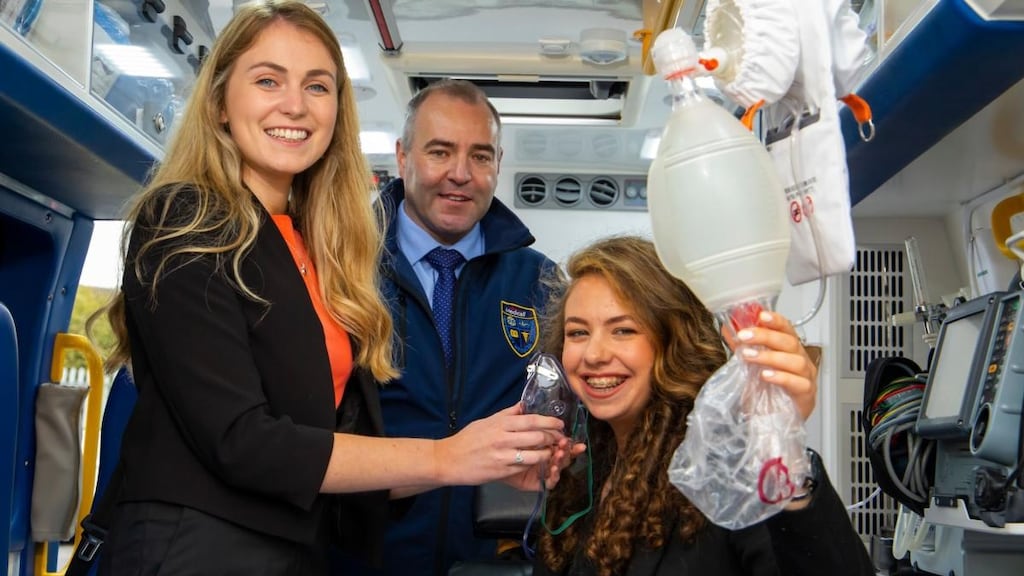Máire Kane and Hannah Grogan, winners of the 2019 national James Dyson Award, with Medicall Ambulance Service operations director Andrew Lyle.