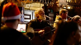Music fans and shoppers sing along as Glen Hansard leads tribute to Shane MacGowan at the Dublin Christmas Eve Busk