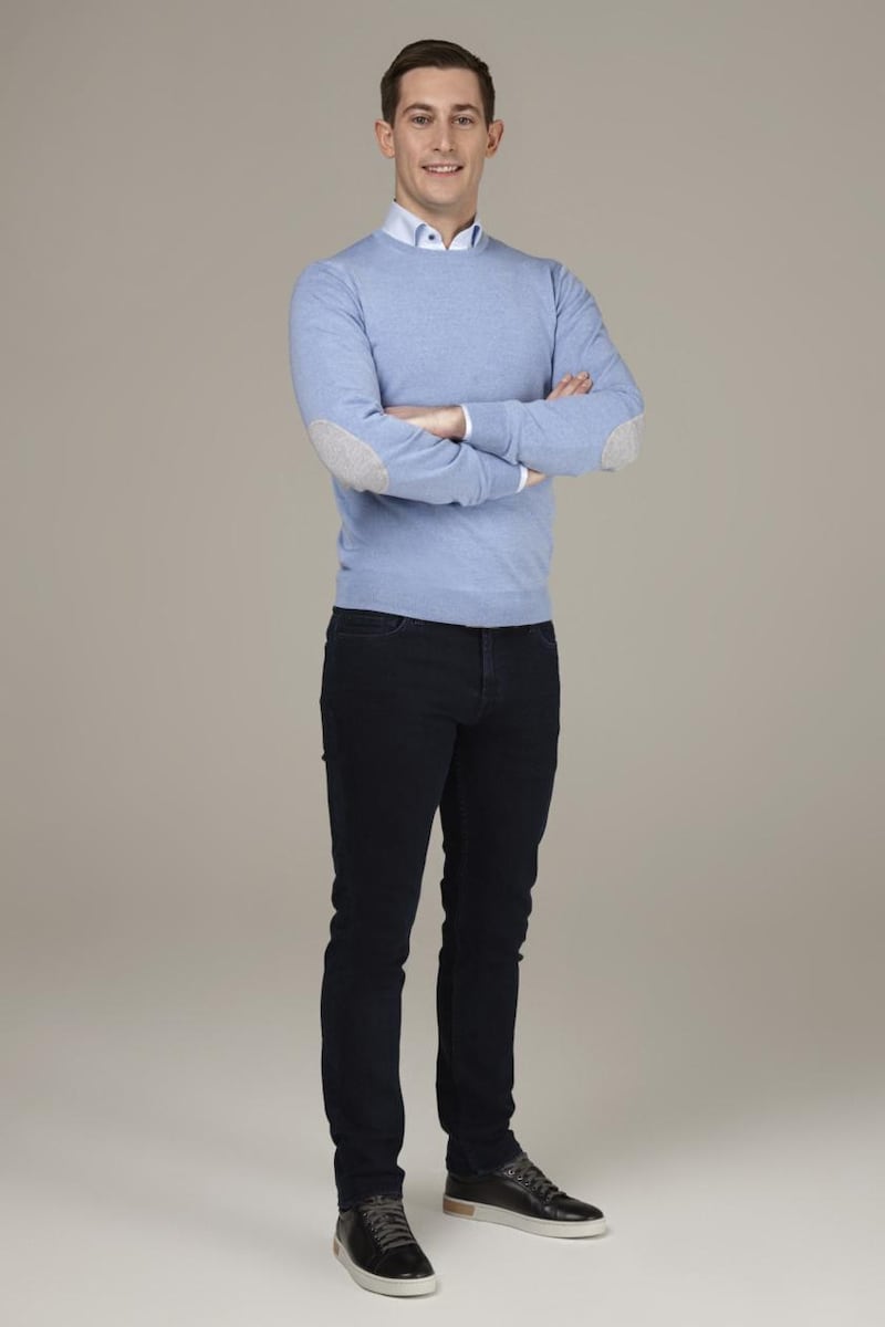 Darragh Collins wears blue crew neck sweater €139 by Stenstroms, jeans 7 for All Mankind €249, white shirt with floral inlay €159 by Stenstroms, belt €59 Louis Copeland, and black runners Magnanni €299.