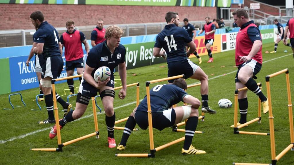Members of Scotland’s rugby squad participate in a team training session at Kingshlom stadium in Gloucester. Photograph: Getty Images