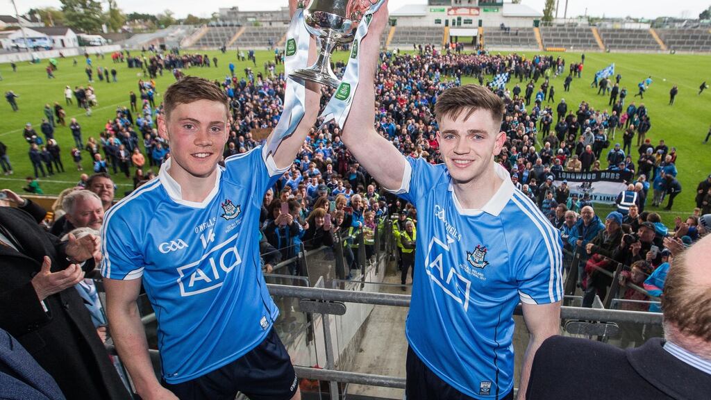 Cillian O’Shea and Con O’Callaghan lift the trophy in Tullamore. Photograph: Inpho