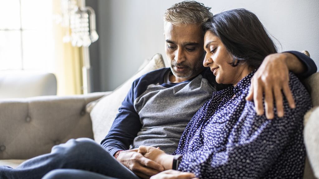 Try scheduling time for intimacy – cuddling or talking in bed, having a date night at home, or having a good old-fashioned kissing session on the couch, with no expectations. Photograph: Getty