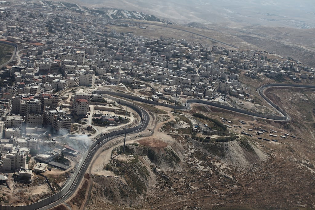 A view of a wall in Jerusalem separating Israeli and Palestinian areas. Photograph: Rina Castelnuovo/ The New York Times