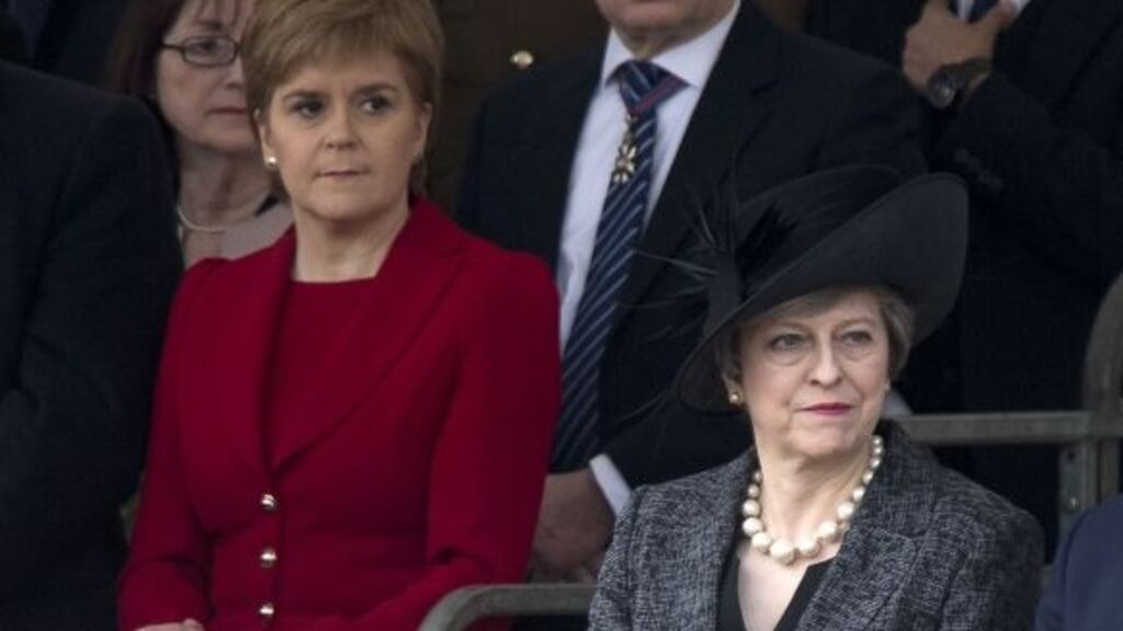 This week’s podcast looks at how Theresa May’s (R) Brexit stakes have been raised by Nicola Sturgeon (L). Photograph: Justin Tallis/Getty Images