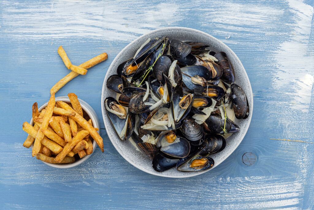 Moules mariniere with skinny fries. Photograph: Harry Weir