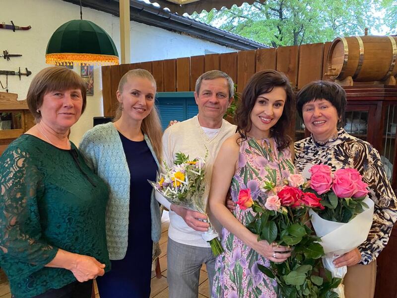 Tetiana (second from right) with  her mother Galina (far right), her father Volodymr and friends Victoria and  Olga